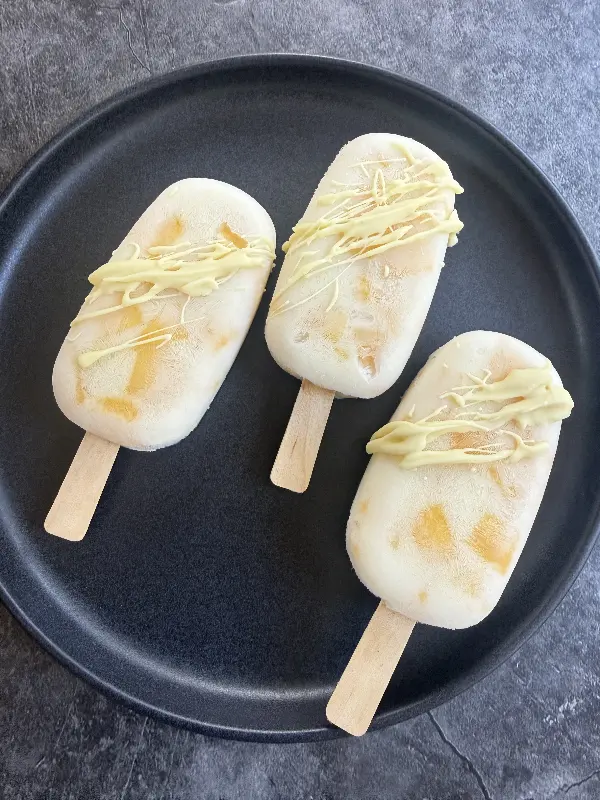 Frozen Mango Yogurt Popsicles